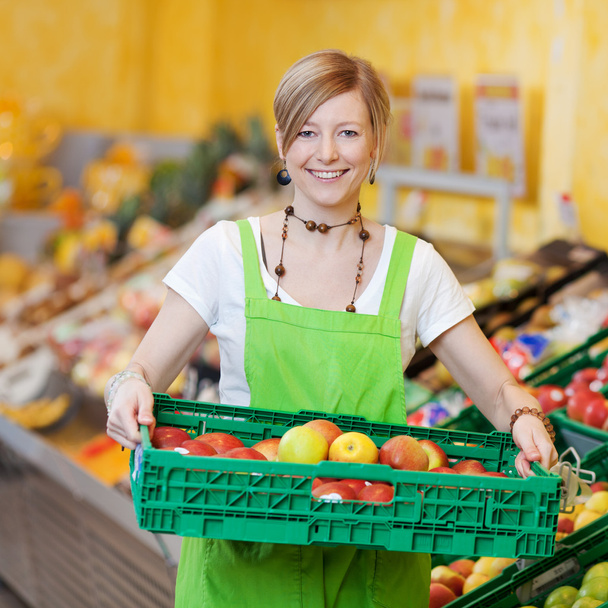 Happy worker in a supermarket - Fotografie, Obrázek