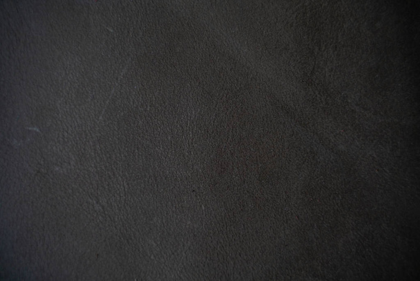 Textura de piel de vaca genuina negra
 - Foto, imagen