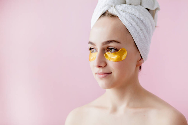 Portrait of Beauty Woman with Eye Patches on pink background. Wo - Fotografie, Obrázek