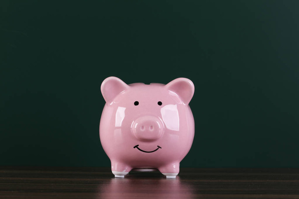 Piggy Bank With Green Background - Valokuva, kuva