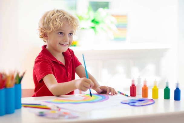 Kids paint. Child painting. Little boy drawing. - Photo, image