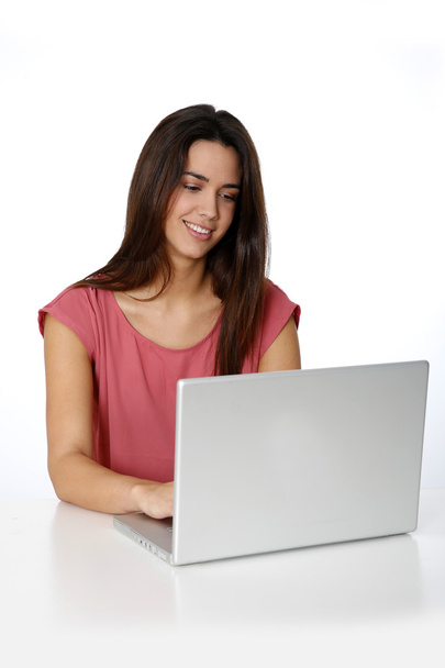 Student girl in front of laptop computer - Fotó, kép