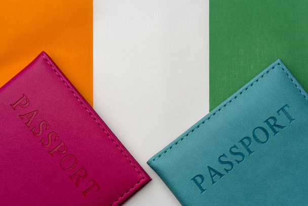 On the flag of cote d'ivoire is a passport. - Photo, Image