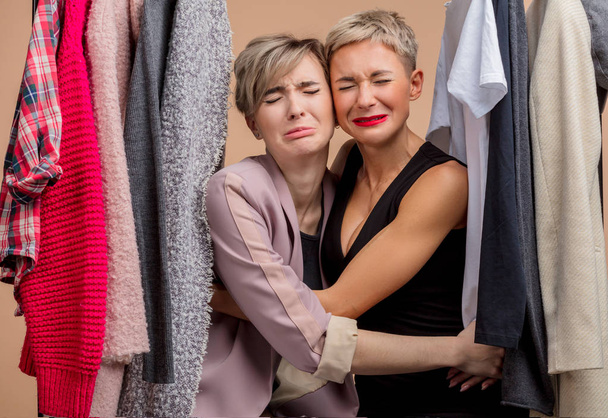 sad beautiful young women are crying while shopping - Foto, Bild