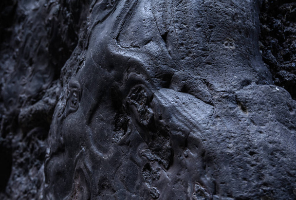 Black frozen lava of the volcano close up - Photo, Image