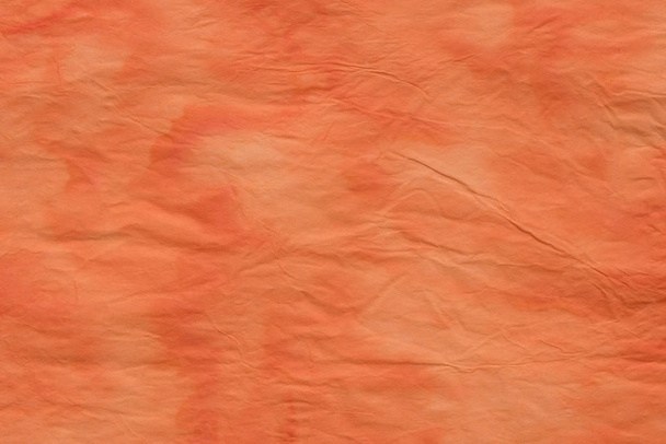 orange faltig Papiertaschentuch Hintergrund Textur  - Foto, Bild