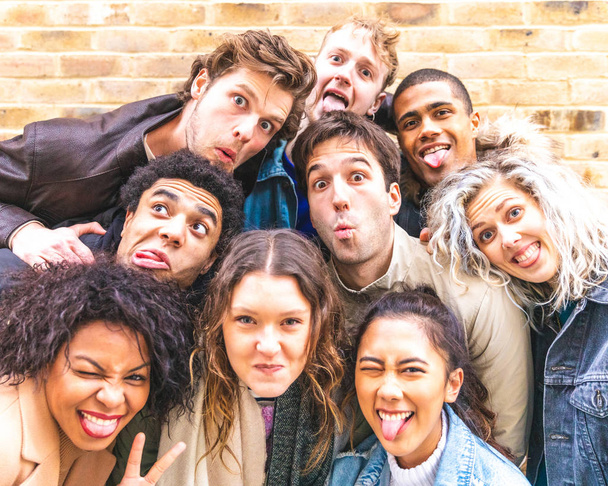 Multiracial friends taking selfie and making funny faces - Photo, Image