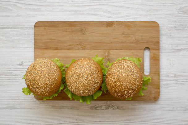 Cooking cheeseburger step-by-step, top view. Flat lay, from abov - Photo, Image