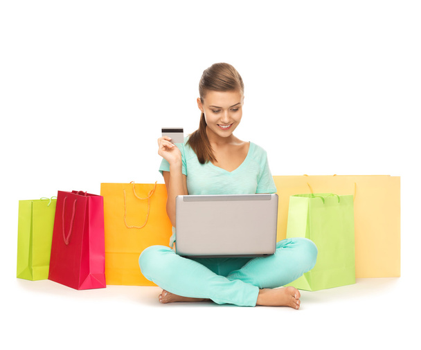 Woman doing internet shopping - Fotó, kép