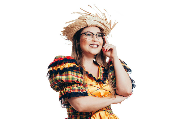 Brazilian woman wearing glasses and typical clothes for the Fest - 写真・画像