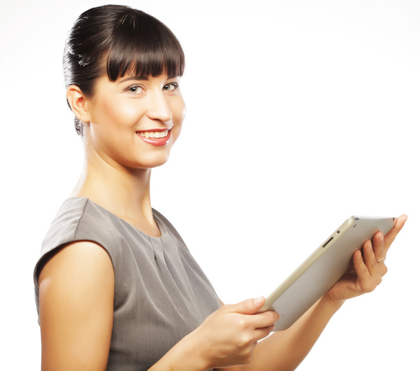 junge Geschäftsfrau arbeitet an Tablet - Foto, Bild
