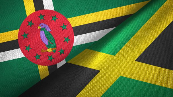 Dominika i Jamajka dwie flagi tkanina tekstylna, tekstura tkaniny - Zdjęcie, obraz