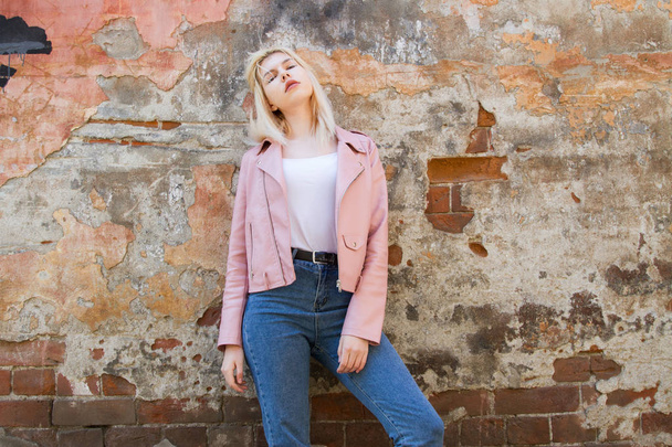 young girl in a pink leather jacket - Photo, Image
