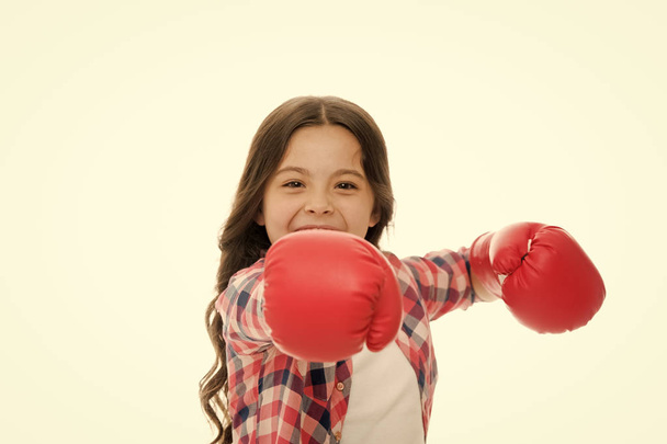 Girl boxing gloves ready to fight. Kid strong and independent girl. Feel powerful. Girls power concept. Feminist upbringing and female rights. Fight for her rights. Female rights and liberties - Foto, Imagen