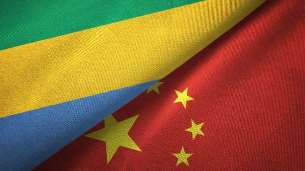 Gabon and China two flags textile cloth, fabric texture - Photo, Image