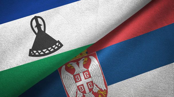 lesotho und serbia zwei flaggen textiltuch, textur - Foto, Bild