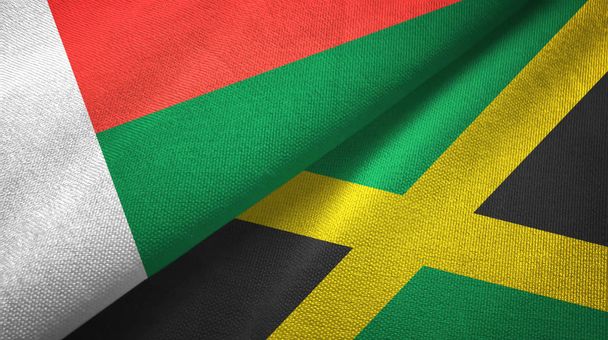 Madagascar and Jamaica two flags textile cloth, fabric texture - Photo, Image