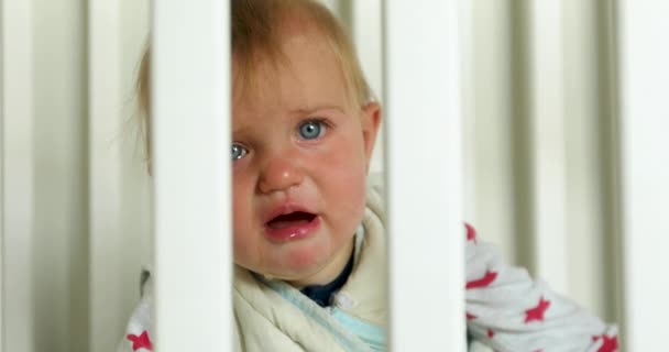 Crying baby in crib at home - Footage, Video