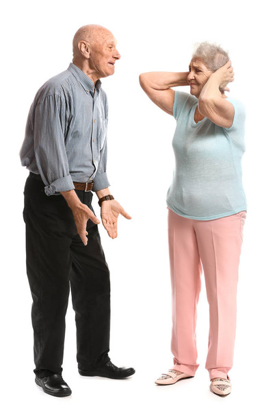 Arguing senior couple on white background - Photo, image