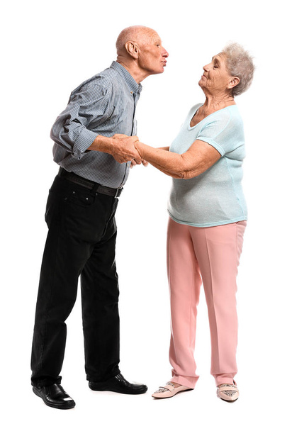 Portrait of senior couple on white background - Foto, afbeelding