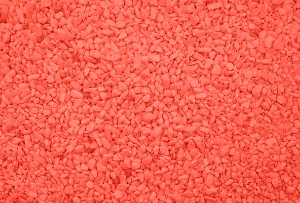 Textura de playa de guijarro de color coral
 - Foto, imagen