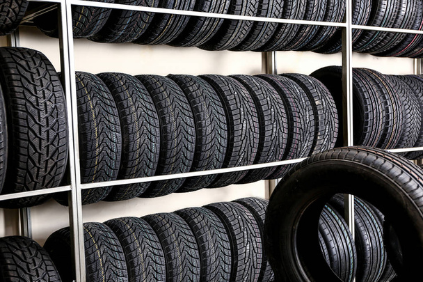 Car tires in automobile store - Photo, Image