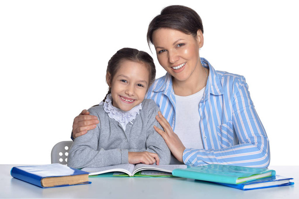mother with daughter reading books - Φωτογραφία, εικόνα