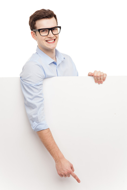 Man in glasses looking at blank sign - Fotografie, Obrázek