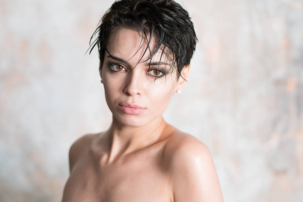 portrait of a young beautiful girl with wet hair - Фото, зображення