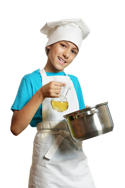 Boy wearing chef uniform - 写真・画像