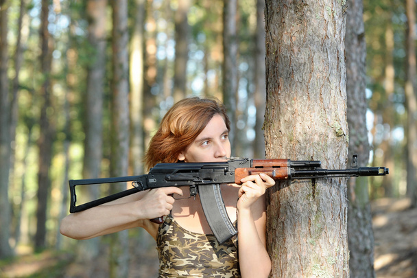 Portrait of a girl with the AKS-74 - Фото, зображення