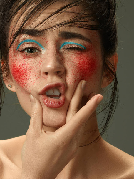 Beautiful female face with perfect skin and bright make up - 写真・画像