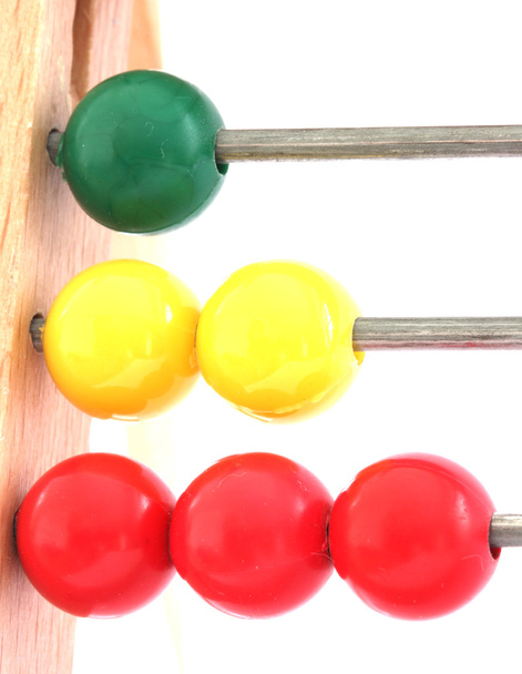 Ряды разноцветных мячей на абакусах
 - Фото, изображение