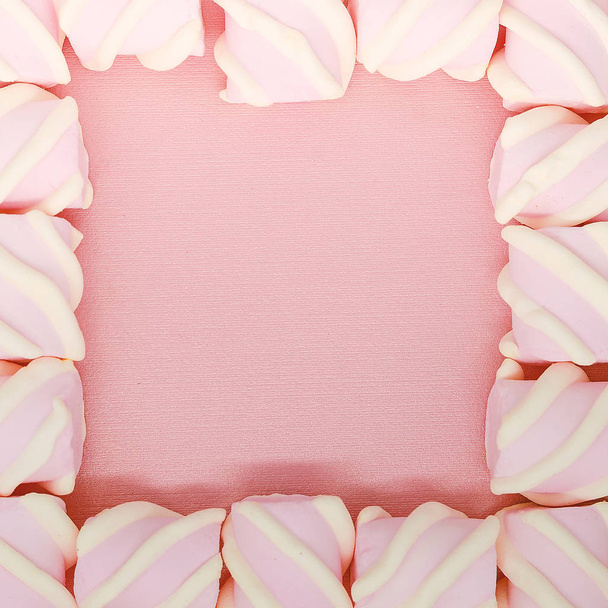 Fondo de malvaviscos rosa de color creativo. Flatley de la
  - Foto, Imagen