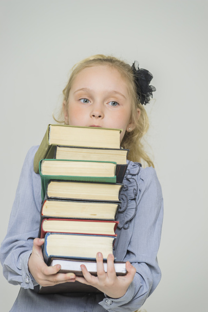 girl with a lot of books - 写真・画像