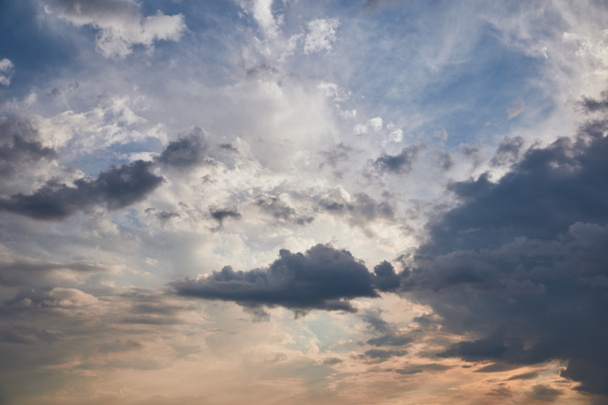 dark clouds on blue sunlight sky background - Photo, Image