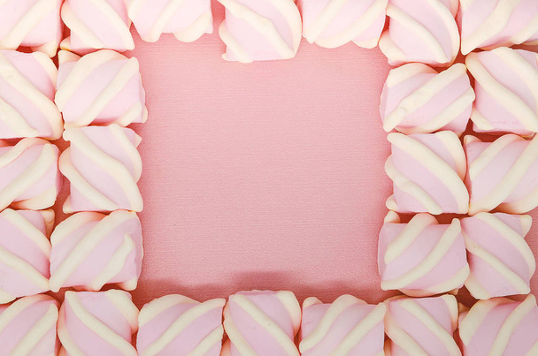 Fondo de malvaviscos rosa de color creativo. Flatley de la
  - Foto, Imagen