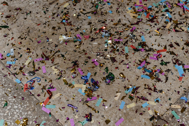 Christmas crackers. after the holiday. Remains of crackers on the floor. - Photo, Image