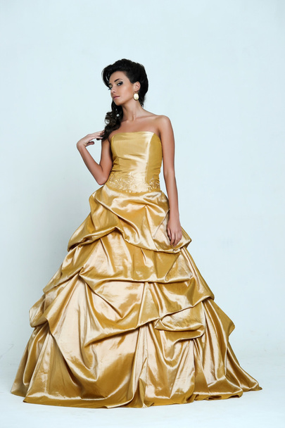 girl in golden dress - Fotó, kép