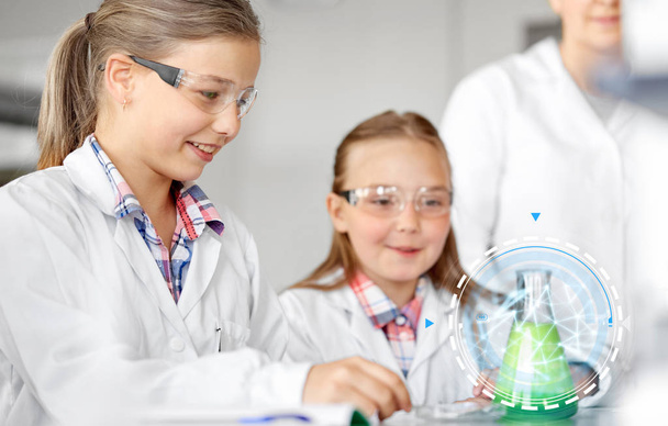 kids with test tube studying chemistry at school - Foto, immagini