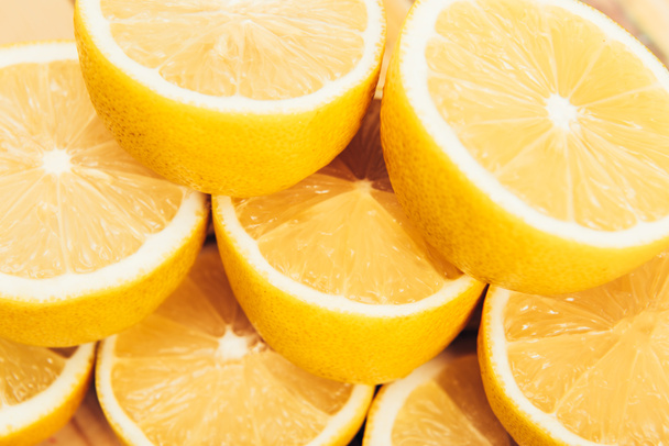 Close up view of fresh, juicy yellow and fresh cut lemons - 写真・画像