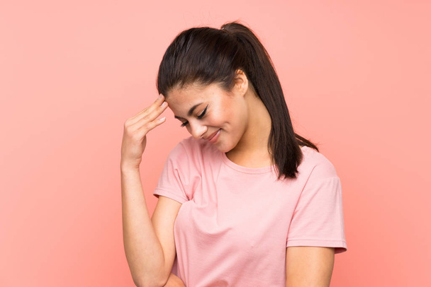 Teenager girl over isolated pink background laughing - Photo, Image