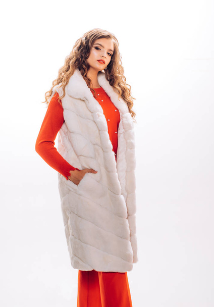 The luxury look. Pretty woman in fashionable fur vest. Fashion model wear luxurious fur. Winter fashion trend. Young woman wear elegant garment. Luxury winter wardrobe. Perfect for cold weather - 写真・画像