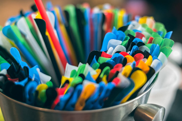 Colorful plastic drinking straws in aluminium bowl - Fotó, kép