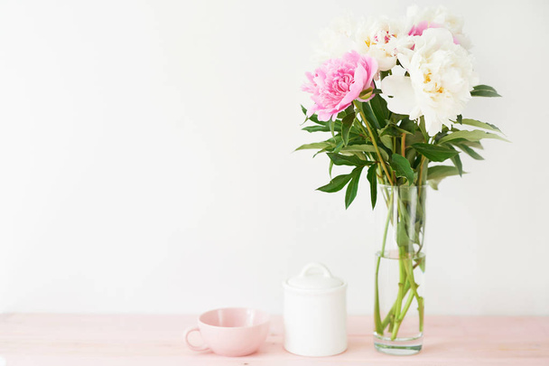 peonies in a vase on a white background - Photo, image