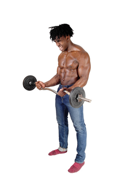 A black man working out with his weighs - Foto, imagen