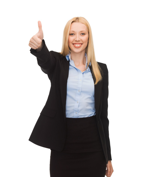 Young businesswoman with thumbs up - 写真・画像