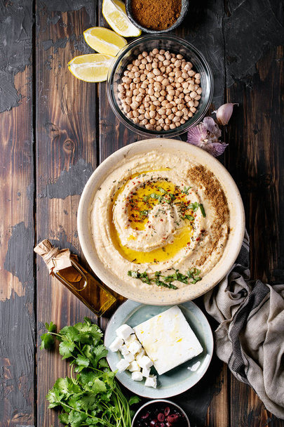 Hummus with olive oil and ground cumin - Fotó, kép