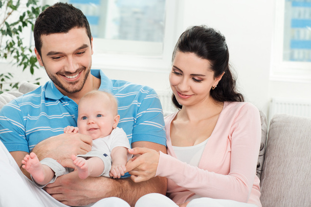 Happy young family with baby - Photo, Image