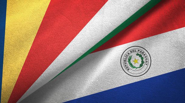 Seychelles e Paraguai duas bandeiras de pano têxtil, textura de tecido
 - Foto, Imagem